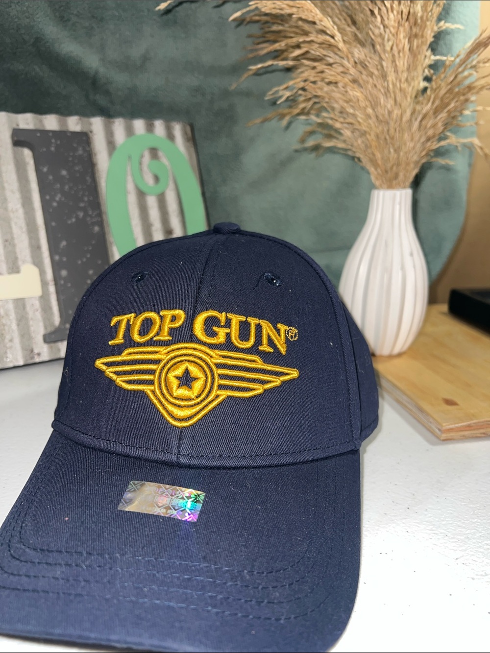 The official Top Gun 3D Wings Logo Hat in Navy